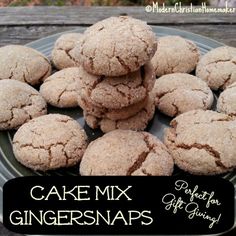 some cookies are stacked on top of each other and the words cake mix ginger snaps