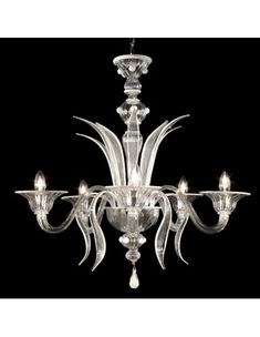 a crystal chandelier with five lights on each arm and one light hanging from the ceiling