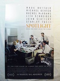 a movie poster for the film spotlight with people sitting around a table in an office