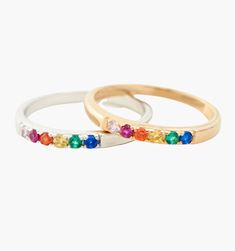 Meet our Mini Rainbow Band Ring- this whimsical piece is adorned with an arc of meticulously selected CZ stones, each shimmering with the joyous hues of the rainbow. Perfect for the color-loving daydreamer, this ring is more than an accessory—it's your very own piece of wearable joy. Adjustable Multi-stone Stackable Rings, Adjustable Rainbow Stackable Jewelry, Adjustable Rainbow Gemstone Ring, Adjustable Rainbow Birthstone Jewelry, Adjustable Multi-stone Rainbow Jewelry, Fine Jewelry: Multicolor Stackable Pieces, Elegant Adjustable Rainbow Rings, Rainbow Multi-stone Birthstone Ring For Anniversary, Multicolor Stackable Fine Jewelry