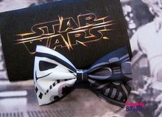 a star wars bow tie with a darth vader t - shirt in the background