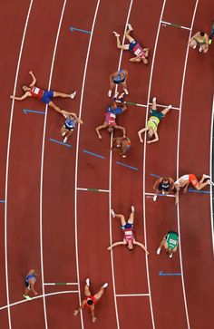 several athletes are competing in a track race