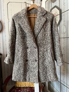 "This chunky tweed coat is from \"Creations Miss Style ... of course,\" made from pure virgin wool in shades of ivory, beige and light and dark brown. It has the original buttons in the front and on the cuffs, two front pockets, and it's fully lined with beige silky lining. The measurements, taken with the coat lying flat, are: shoulder to shoulder, 19 inches; armpit to armpit, 21 inches; sleeves, 23 inches; length, 34 inches; bottom edge, 30 inches. In very good condition." Brown Tweed Jacket, Brown Wool Coat, Jacket Beige, Brown Tweed, Tweed Coat, Coat Winter, Short Coat, Brown Beige, Tweed Jacket