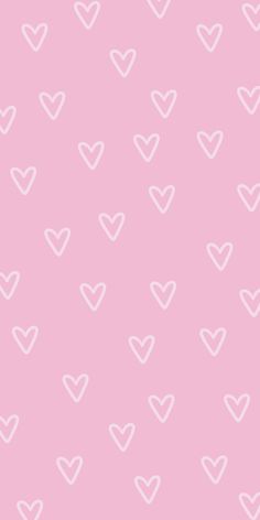 a pink background with white hearts on it