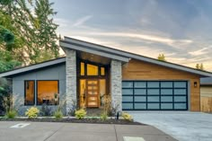 a house with a large driveway in front of it