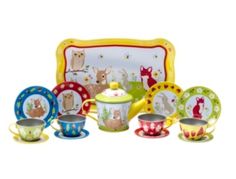 an assortment of tea cups and saucers with animals on them