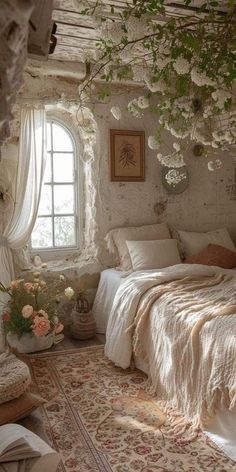 a bed sitting under a window next to a white rug on top of a floor