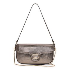 The ariel flap shouder bag can be converted into crossbody bag.Closure Type: Magnetic SnapPockets: 1 Back Slip Pocket, 1 Inside Zip PocketMetal Color: Gold ToneMeasurements: 10 Width/Inches, 5.5 Height/Inches, 1.5 Depth/InchesHandle Drop Length: 10 InchesMax Strap Drop Length: 25 InchesBase Material: 100% Faux LeatherFabric Description: Faux LeatherLining Material: PolyesterCare: Wipe CleanCountry of Origin: Imported Daily Use Crossbody Baguette Bag With Magnetic Closure, Trendy Crossbody Shoulder Bag With Magnetic Closure, Crossbody Baguette Bag With Magnetic Closure, Trendy Evening Bag With Flap, Elegant Flap Shoulder Bag With Mobile Phone Pocket, Trendy Evening Flap Shoulder Bag, Gold Crossbody Shoulder Bag With Magnetic Closure, Everyday Crossbody Flap Bag With Silver-tone Hardware, Crossbody Flap Bag With Silver-tone Hardware For Daily Use