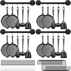 pots and pans are hanging on the wall with clips to hang them from hooks