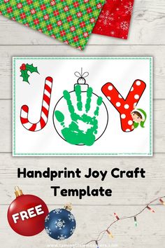 the joy handprint joy craft template is shown with christmas decorations and ornaments around it