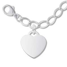 The lovely charm bracelet for her from the Rembrandt Charms® collection features a sterling silver heart that dangles from a 7-inch chain. The bracelet secures with a lobster clasp. Classic Sterling Silver Charm Bracelet With Heart, Sterling Silver Charm Bracelet With Heart Dangle, Sterling Silver Heart Bracelet With Charms, Sterling Silver White Gold Charm Bracelet With Heart Charm, Classic Heart Charm Bracelet For Valentine's Day, Personalized Heart-shaped White Gold Charm Bracelet, Personalized White Gold Heart Charm Bracelet, Sterling Silver Heart Charm Bracelet With Lobster Clasp, Heart Shaped Charm Bracelet In Sterling Silver