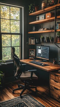 a desk with a computer, chair and bookshelf in front of a window