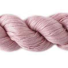 a skein of pink yarn on a white background