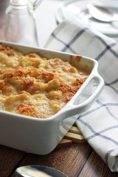 a casserole dish with meat and cheese in it