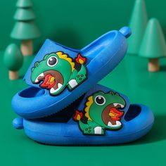 Dinosaur Slide Sandals: Adventure & Comfort Wrapped into One Looking to take your little ones on an adventure they won’t soon forget? Give them our Jurassic Adventure Dinosaur Slide Sandals and watch their faces light up! Perfect for toddlers and preschoolers who seek comfort, support and fun, these dinosaur-themed slide sandals feature fun, vibrant colors and soft, padded straps. Let your mini explorers conquer any adventure with confidence. Unique Design = Maximum Comfort We've designed these Kids Sandals Summer, Dino Footprint, Dinosaur Shoes, Girl Dinosaur, Led Shoes, Kids Rain Boots, Kids Rain, Light Up Shoes, The Good Dinosaur