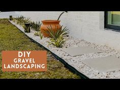 a white brick building with some plants in front of it and the words diy gravel landscaping