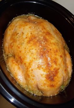 a close up of a chicken in a crock pot