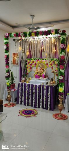 a mandap decorated with flowers and garlands