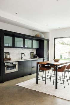 the kitchen is clean and ready to be used for cooking, dining or as an entertaining area