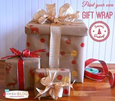 two wrapped presents sitting on top of a wooden floor