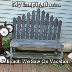 a bench that is sitting in front of a house with a teddy bear on it