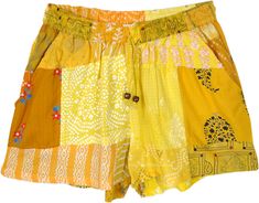 The warm yellow hues add subtle fun to your wardrobe this season with these sustainable, comfy, and unique shorts.  The shorts comprise multiple pieces of recycled or leftover fabric sewn together. #tlb #JuniorPetite #beachwrap #Indian #Handmade #HippieShorts #BeachShorts #PatchworkShorts Yellow Patchwork Bottoms For Spring, Spring Yellow Bottoms With Patchwork, Casual Yellow Patchwork Bottoms, Spring Yellow Patchwork Bottoms, Yellow Cotton Shorts With Pockets, Casual Yellow Cotton Shorts, Yellow Cotton Shorts For Spring, Casual Patchwork Shorts, Mustard Cotton Shorts