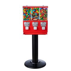 a red gummy machine sitting on top of a black stand with lots of candy in it