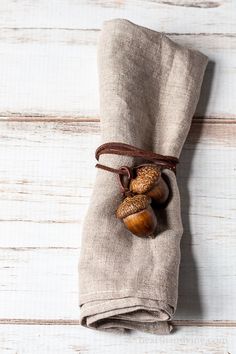 acorn napkin ties are wrapped in burlock