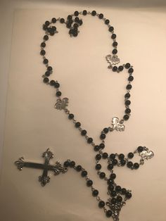 Inspired by Nancy Downs. Large handmade rosary style necklace. Approximately 26 inches from top of clasp to bottom of cross when worn. Nice large size to layer with other necklaces or on it's own. Handmade with black pearl glass beads, alloy bats.  If there's a cross you see that i have on my site that you want to substitute instead of the cross as shown, that's totally fine, convo me for details. Will be presented in organza gift bag.  Every necklace is made to order please allow several days f Silver Crucifix Jewelry With Black Beads, Silver Rosary With Black Beads And Crucifix, Nas Hip Hop, Nancy Downs, Belly Conklin, Rosary Style Necklace, Miniature Terrarium, Terrarium Necklace, Necklace Gothic