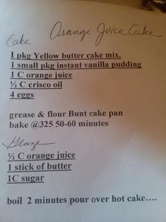 a recipe for orange juice cake on a piece of white paper with writing in it