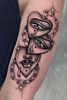 a woman's arm with tattoos on it and an image of a heart in the middle