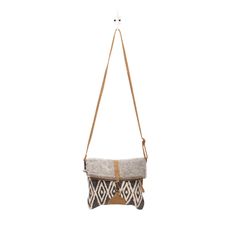 This FOLD OVER stylish cross-body bag offers storage for your tablet and other essentials for a day of traveling or a trek through the urban jungle. The combination of cowhide and honey bee print looks chic. Materials: Canvas, Hairon, Leather, & Rug Measurements:- Depth: 2.5"- Shoulder: 22"- Width: 10.5"- Height: 10.5" Rug Measurements, Boho Cross, Leather Rug, Bee Print, Looks Chic, Urban Jungle, The Urban, Honey Bee, Fold Over