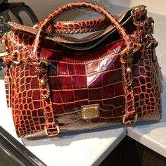 Dooney And Bourke Embossed Crocodile Small Satchel In Cognac Color. New Condition. Comes With Dust Bag. This Is A Brand New Bag. Elegant Michael Kors Luxury Bucket Bag, Luxury Elegant Michael Kors Bucket Bag, Michael Kors Joan Handbag, Crocodile Purse Handbags, Italian Purses, Crocodile Handbags, Luxury Tote Bags, Ethiopian Opal Ring, Patent Leather Handbags