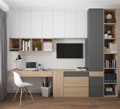 a room with a desk, bookshelf and television on the wall in it