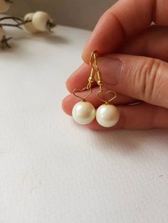 Pearl Heart Earrings Golden Pearly Drops Single Pearl | Etsy Pearl Heart-shaped Earrings For Gifts, White Heart Drop Earrings For Jewelry Making, Heart-shaped Pearl Earrings For Gifts, Heart-shaped Pearl Earrings Gift, Elegant Adjustable Heart Earrings For Gift, Handmade Heart Earrings For Wedding On Valentine's Day, Pearl Drop Heart Earrings Gift, White Heart-shaped Pearl Earrings Gift, Elegant Adjustable Heart Dangle Earrings