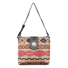 Zip Top Shoulder bag with adjustable shoulder strap. 100% buttery soft chrome leather is accented with woven tapestry, featuring a floral silver concho. Back of the bag has a zipper compartment for even more organization. Inside has a zipper compartment and open pouches. Hidden back wall compartment has zipper openings on either side on the bag, and is lined in genuine chrome leather (pocket will fit gun of overall length 7" and overall height 5"). Each handbag includes a protective storage bag. Tapestry Shoulder Bag With Removable Pouch For Travel, Travel Shoulder Bag With Removable Pouch In Tapestry, Tapestry Shoulder Bag With Removable Pouch, Tapestry Bag For Everyday Use, Tapestry Shoulder Bag For Travel, Brown Tapestry Bags With Adjustable Strap, Tapestry Shoulder Bag With Adjustable Strap, Everyday Tapestry Satchel With Adjustable Strap, Travel Shoulder Bag With Adjustable Strap In Tapestry