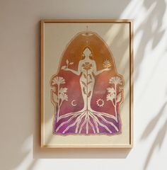 a painting hanging on the wall in front of a white wall with a plant and tree