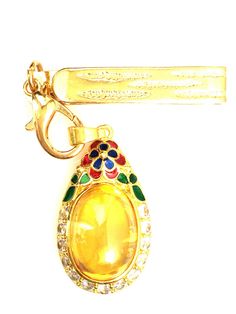 This is a perfect and unique style magic pendant made of yellow naga eye stone oval shape with gold clip, the power of the pendant is to bring good luck, charming and wealth to the wearer, The pendant showcases an elegant design with rare amulet style. It is great to get this pendant for your loved one or treat yourself for a classic timeless style. Stone Size: 2 x 3 cm., Stone Type: yellow naga eye stone, Metal Type: stainless and silver, gold micron, Weight: 46.95 Gram (Approx.) Free 1x gold micron clip for the amulet Stone Magic, Magic Pendant, Lady Girl, Timeless Classic Style, Gold Clips, Eye Stone, Oval Shape, Good Luck, Types Of Metal