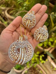 Hey, Welcome to our shop! Indian Wedding Bridal Pakistani Bollywood Style Manish Malhotra Sabyasachi Inspired Monalisa Stone Elephant Designer Most Premium Finish Victorian Antique Moissanite Zirconium Kundan Doublet Diamond Golden Long Pendant Necklace Set Statement Jewelry Set Unique Jewelry With Sud Earring For Women And Girl. Best Gift For Engagement / Anniversary /Birthday   < 1 DAY ITEM SHIPMENT  |  7-8 Days Delivery TIME> About our Jewellery -  Classic, Brilliant & Elegant. We deal in all type of Premium Indian Bollywood Jewellery. * AD Jewelry set * Kundan Necklace * Polki Jewellery * Uncut Jewellery * AD Ring * AD Bangles * AD Pendant Set * Pachi Kundan & many more.. * All our products are made with high-quality stones, the intricate texture and design makes it a must-have for eve Traditional Wedding Sets With American Diamond, Festive American Diamond Bridal Sets For Celebration, Diamond Pendant Sets Unique, Bridal Pakistani, Gift For Engagement, Diamond Bracelet Design, Antique Gold Jewelry Indian, Diamond Pendants Designs, Gold Necklace Indian Bridal Jewelry