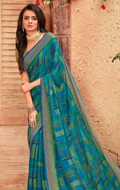 Blue Semi-stitched Saree With Printed Border, Multicolor Self Design Georgette Pre-draped Saree, Multicolor Self Design Georgette Saree, Semi-stitched Blue Saree With Printed Border, Multicolor Georgette Pre-draped Saree With Self Design, Blue Saree With Printed Border For Eid, Multicolor Self-design Georgette Pre-draped Saree, Blue Georgette Saree With Printed Border, Multicolor Anarkali Style Georgette Saree