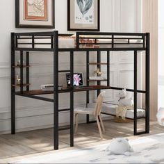 a loft bed with a desk underneath it in a room that has white walls and wood floors