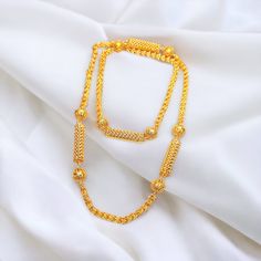 22k Dubai Gold plated Indian Long mala for women.  Best Simple Gift for anyone.  Gold Finish long Mala necklace/ Haar 32-34 inches long. Thick Size 1 inches + Good Choice for Any summer outfit,  can a unique choice with Sare , Lehenga,  Over Hijab because of long length.  it's hard to understand that Plated,  look like real gold chain Mala. Handmade Necklace are well finished and clean work. *We Ship SAME Day if you place order between  1 am to 1 pm.  or Next working day from New York city with Jumka Earrings, Dubai Gold Jewelry, Indian Gold Jewelry, Real Gold Chains, Types Of Gold, Simple Gift, Gold Armband, Gold Long Necklace, Gold Jewelry Indian