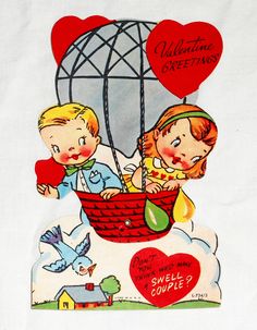 an old valentine card with two children in a hot air balloon