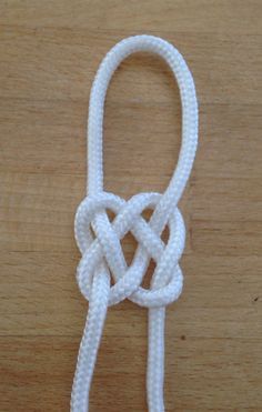 a white rope with an knot on it