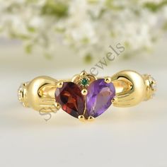 pear Shaped Natural Garnet And  Natural Amethyst Engagement Ring ,Wedding  Band * Item Description >Metal:- 925 Sterling Silver >Band Colour:-Yellow >Gem Stone: natural garnet/ Natural Amethyst > Gem stone size: 4x6 mm / 2 pcs > Gem Shape  :- Pear > Gem Colour :- Red / blue > Side Stone :- Cubic Zircon >Gem Shape:- Round > Gem Colour :- white > High Quality Gem Stone Setting >Plating  Availability:-  White Rhodium plating/Yellow Gold Plating/Rose Gold Plating/ Silver FEATURE  >  CUSTOM  ORDER<   We can create almost any ring , earrings , necklace you desire with high quality and   affordable price. please message us for details. curved wedding bands can be customized for your engagement ring. please order asap and send me  some pictures of your ring.  > ENGRAVING<   I will be happy to add Heart-shaped Amethyst Birthstone Ring, Elegant Amethyst Heart-shaped Birthstone Ring, Ruby Claddagh Ring, Gold Claddagh Ring Women, Unique Claddagh Ring, Yellow Gems, Amethyst Ring Engagement, Amethyst Gem, Wedding Band