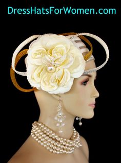 Ladies 1920's Style Flapper Art Deco Era Ivory Metallic Gold Pillbox Church Wedding Bridal Cocktail Hat. This Formal Straw Braid Hat Is Embellished With A Large Ivory Double Loop Bow Enhanced With Clear Acrylic Rhinestones, Accented With Two Metallic Gold Double Looped Bows. A Large Ivory Millinery Silk Flower With A Large Pearl Center Is Placed In The Center Of This Beautiful Custom Made Bow.  Four Rows Of Rhinestones Encircle The Crown Of This Fashion Wedding Headpiece. This Designer Hat Is Su Vintage Wedding Costume Hat With Pinched Crown, Vintage Wedding Hat With Pinched Crown, Adjustable Vintage Fascinator For Wedding, Vintage Headpieces For Wedding And Kentucky Derby, Vintage Wedding Headpiece For Kentucky Derby, Cream Gatsby Style Hat, Adjustable Cream Gatsby Hat, Cream Adjustable Gatsby Hat, Vintage Cream Mini Hat For Formal Events