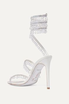 Silver Cleo embellished metallic satin and leather sandals | René Caovilla | NET-A-PORTER Designer Ankle Strap Sandals With Rhinestones, Luxury Crystal Embellished Ankle Strap Sandals, Crystal Embellished Open Heel Sandals For Gala, Glamorous Embellished Sandals With Single Toe Strap, Luxury Embellished High Heel Sandals, Luxury High Heel Embellished Sandals, Chic Embellished Sandals With Single Toe Strap, Luxury Rhinestone Open Toe Sandals, Glamorous Sandals With Single Toe Strap For Events