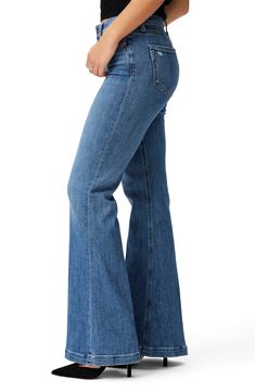 Dramatically flared legs add undeniable '70s boogie to high-rise, full-length jeans cut from vintage-inspired stretch denim in a fading-blue wash. 34 1/2" inseam; 24 1/2" leg opening; 10" front rise Zip fly with button closure Five-pocket style 91% cotton, 7% polyester, 2% spandex Machine wash, line dry Imported Mid-rise Medium Wash Flares For Fall, High-rise Medium Wash Flares With Five Pockets, Fall Denim Blue Flare Jeans, Fall Blue Wide Leg Flares, Mid-rise Blue Flares For Fall, High Rise Blue Flares For Fall, Mid-rise Denim Blue Flares For Fall, High Rise Denim Flares For Fall, Fall Light Wash Full Length Flare Jeans