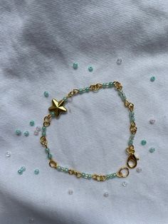 Handmade bracelet made from steel jumprings and eyepins! ఌ✩ With star and colorful beads ☆☆彡 Now also shipping internationally!! The color of the beads can also be customized (stars: gold, silver & rose) small beads all colors! Customized Orders might take a little longer (not more than one additional day!❤︎︎) If you have any questions let me know I'd be very glad to answer them☆ఌ𖦹꧂ Cute Handmade Gold Beaded Bracelets, Gold Charm Bracelet With Colorful Beads For Friendship, Star-shaped Beaded Friendship Jewelry, Beaded Bracelets With Star Charm For Gifts, Gold Charm Bracelet With Colorful Beads For Jewelry Making, Star-shaped Colorful Beaded Bracelets As Gift, Handmade Gold Star Bracelets, Handmade Star-shaped Gold Bracelets, Handmade Gold Charm Bracelet With Round Beads