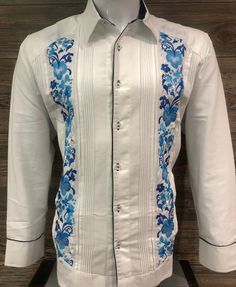 Mexican Guayabera. Presidential Style. Beautiful and Elegant. Handcrafted in Merida, Yucatan Mexico. Made out of 100% Fresh Fine Linen Fabric Royal Blue & Sky Hummingbird Flower Embroidery Navy Blue Combination on Neckline and sleeves Long Sleeve. Beautiful Elegant Guayabera Shirt. Good for Casual wear, Wedding, Fiesta, Tropical, Birthday or any other occasion. 100% Brand New Please refer to size chart for proper fitment. Thank you. Navy Blue Combination, Guayabera Wedding, Blue Flower Embroidery, Merida Yucatan Mexico, Wedding Fiesta, Blue Combination, Fiesta Tropical, Guayabera Shirt, Wedding Shirt